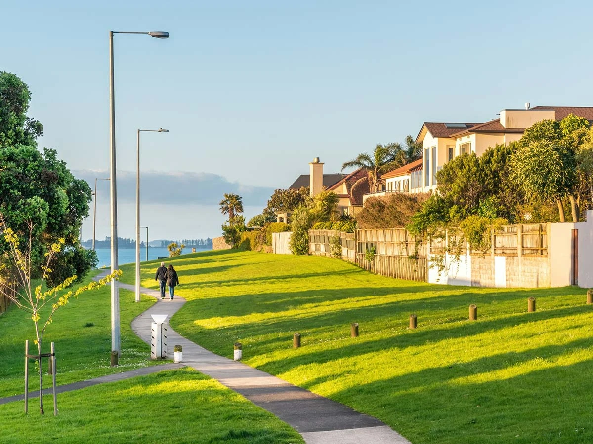 A peaceful, green pathway within a secure gated community in Brazil, showcasing safe residential options for expats.